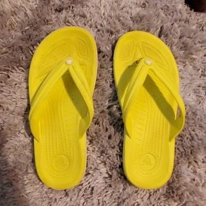 Neon croc flip flops